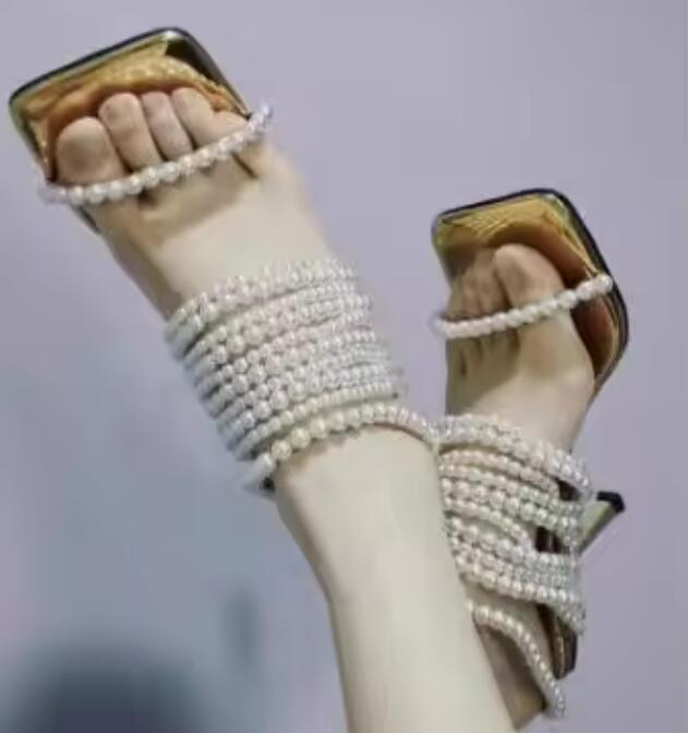 Glanzende parelkettingen Bandj - Gold Chain Sandal recensie en prijs